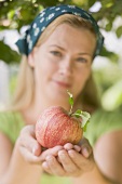 Woman holding an apple