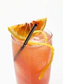 Blood orange drink with ice cubes