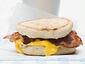 English muffin filled with bacon and cheese