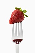 A strawberry on a fork
