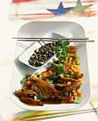 Duck with stir-fried vegetables and pumpkin seeds