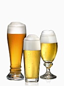 Three different glasses of beer