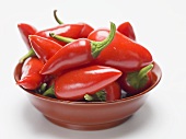 Red chillies in a red dish