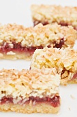 Coconut slices with raspberry jam filling