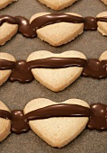 Heart-shaped biscuits with chocolate icing