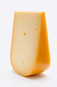 A piece of Gouda cheese