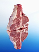 Raw Porterhouse steak with reflection