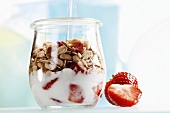 Yoghurt with muesli and strawberries