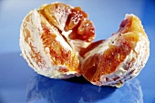 A peeled and halved orange