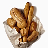 Assorted Bread Loaves on a Linen Cloth