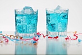 Two Blue Drinks with Ice; Party Streamers