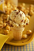 Caramel ice cream cone with caramel popcorn
