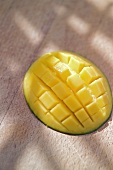 Diced mango still attached to the skin