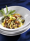 Tagliatelle with fried duck breast, courgettes and sage