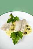 Eel fillets with caper sauce
