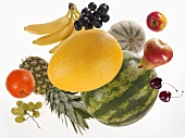 Various types of fruit against white background