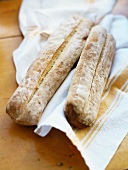 Freshly baked loaves of bread (long)