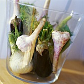 Aubergine, garlic and fennel in a glass