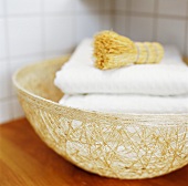 Basket of towels and brushes