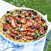 Vegetable tart on a table out of doors
