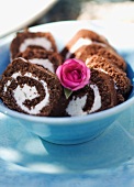 Slices of chocolate Swiss roll