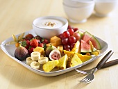 Plate of fruit with dip