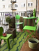 Balcony of a city flat with garden ornaments