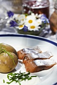 Salmon fillet with potatoes and chive sauce