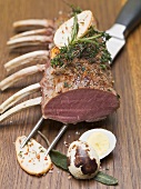 Rack of lamb with herbs, fried potatoes and quail's egg