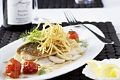 Fried fillet of sea bream on scallops