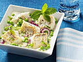 Fish ragout with peas and mint