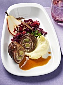 Beef roulade with pear, red cabbage and chocolate and mashed potato