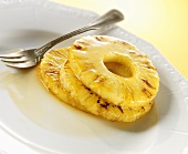 Fried pineapple slices with honey