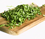 Shredded parsley on chopping board