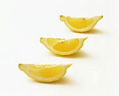 Three lemon wedges