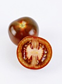 Tomato, whole and halved