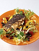 Salmon fillet with salad