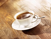 A cup of tea on a wooden table