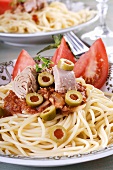 Spaghetti with tuna, olives and tomato sauce