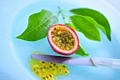 Half a passion fruit with leaves, Thailand