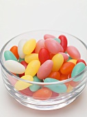 Coloured sugar eggs in glass bowl