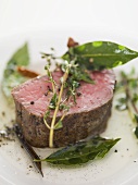 Beef fillet with bay leaves and thyme