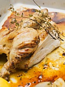 Half a roast chicken with thyme