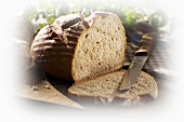 Crusty bread, partly sliced