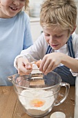 Two boys baking