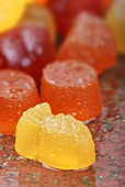 Assorted wine gums with drops of water