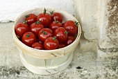 Tomatoes in a woodchip basket