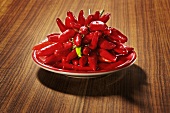 Many red chillies on a plate