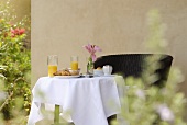 Small breakfast table on a terrace