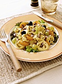 Tortellini salad with oranges and grapes